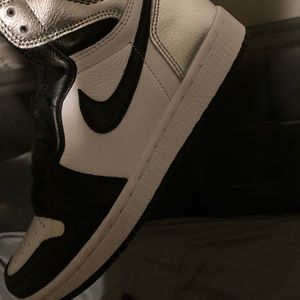 Nike Jordan 1’s, high-top. Size 7 1/2 women, silver/black. Never been worn